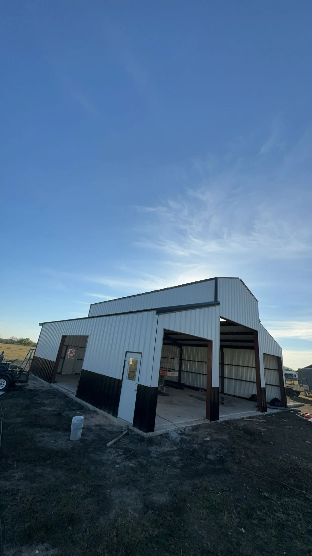 White and black commercial metal building