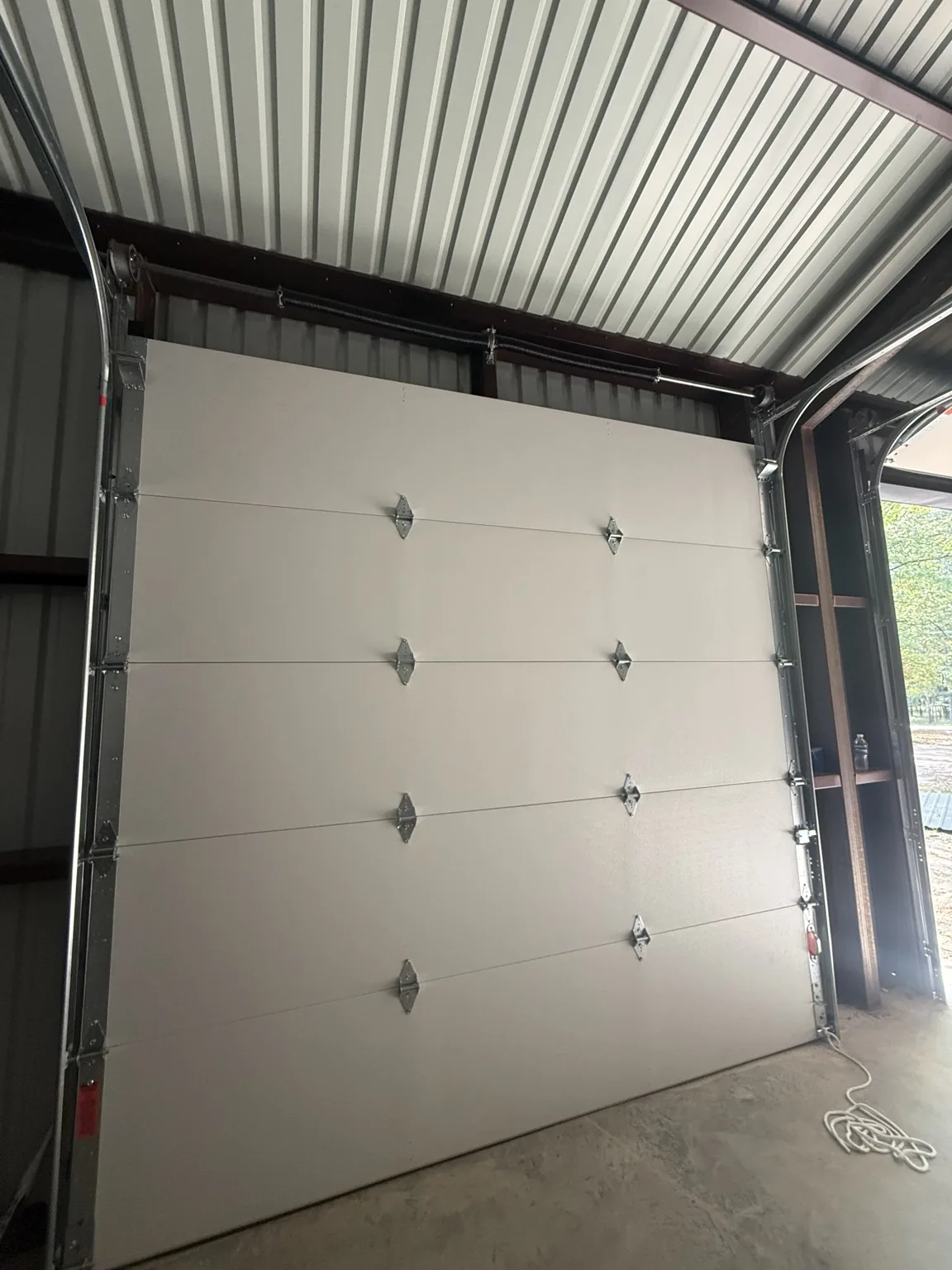 Interior view of a closed insulated sectional overhead door
